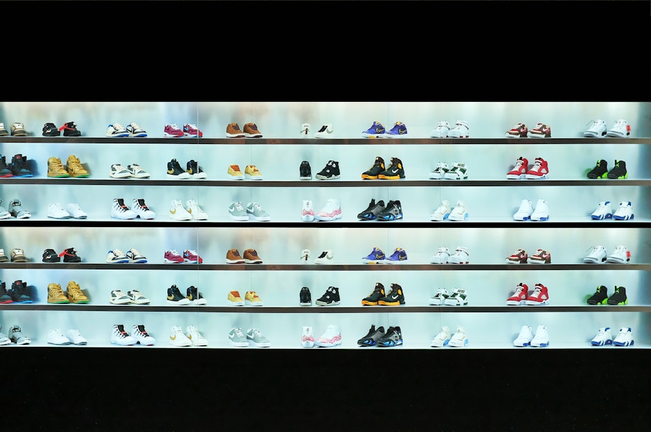 a display case filled with lots of different types of shoes
