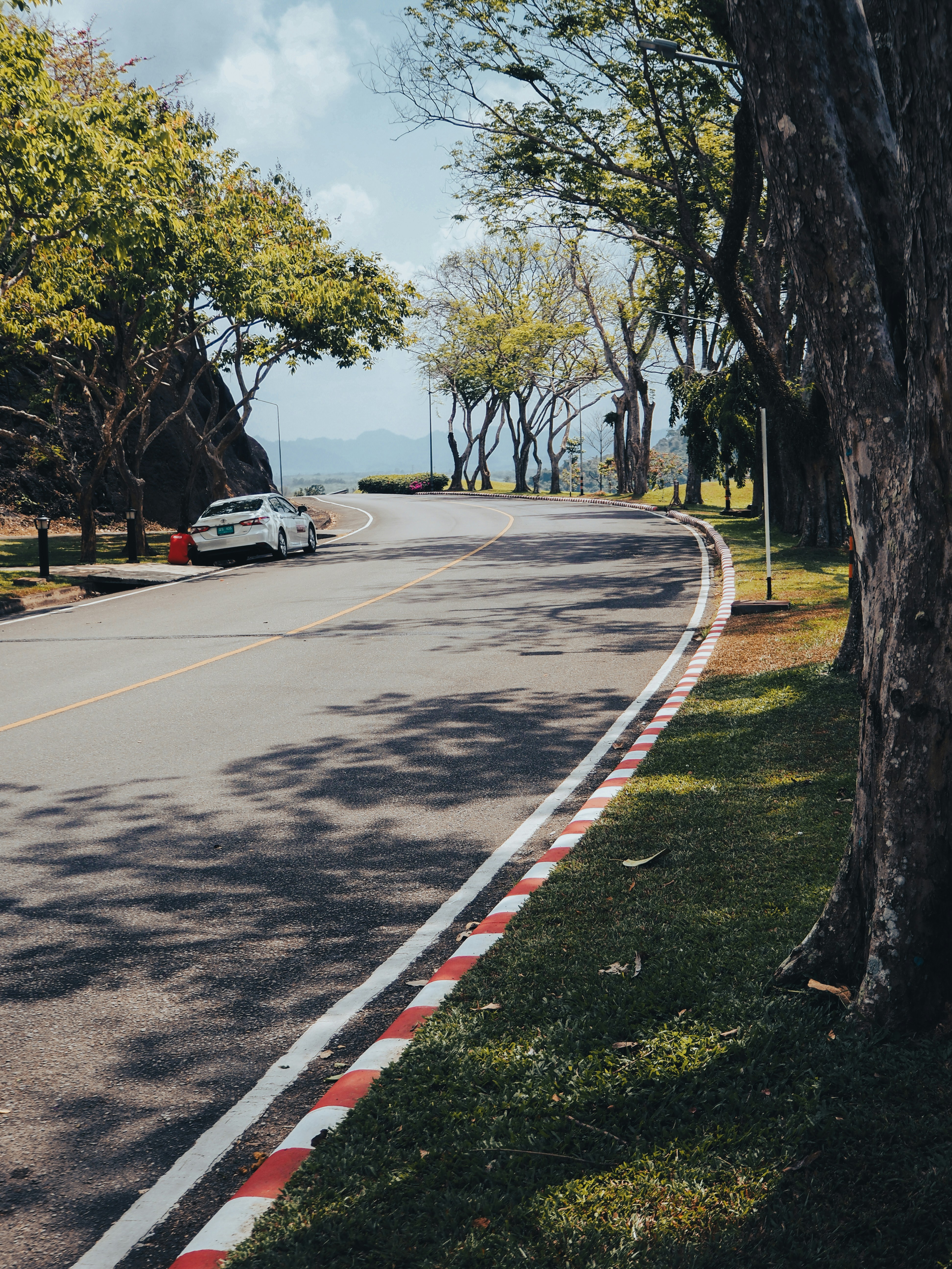 a car is parked on the side of the road