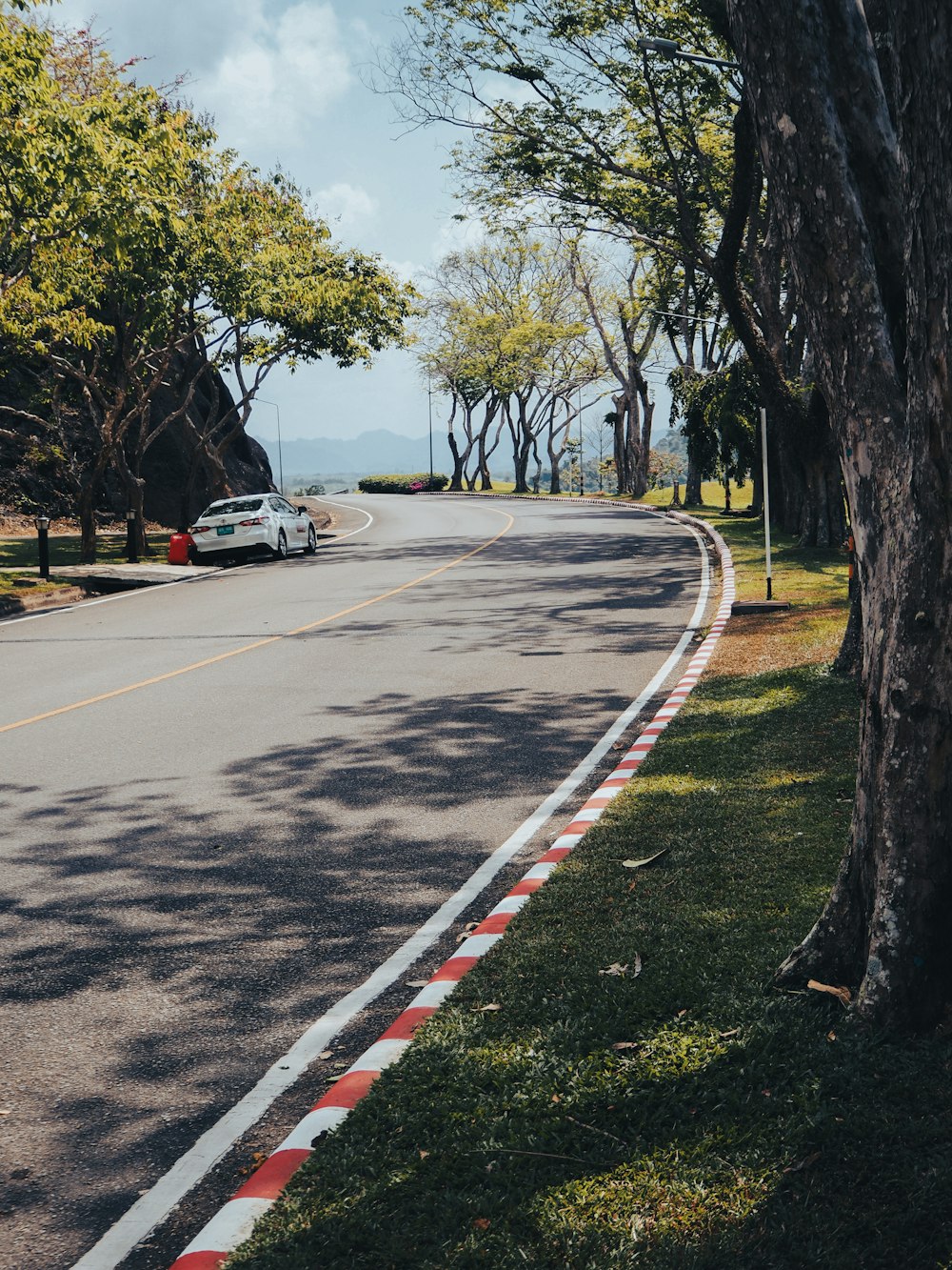 a car is parked on the side of the road