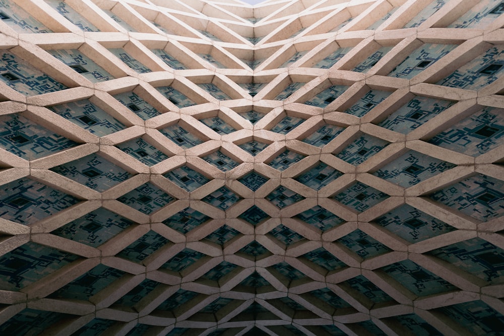 a close up of a building with a sky in the background