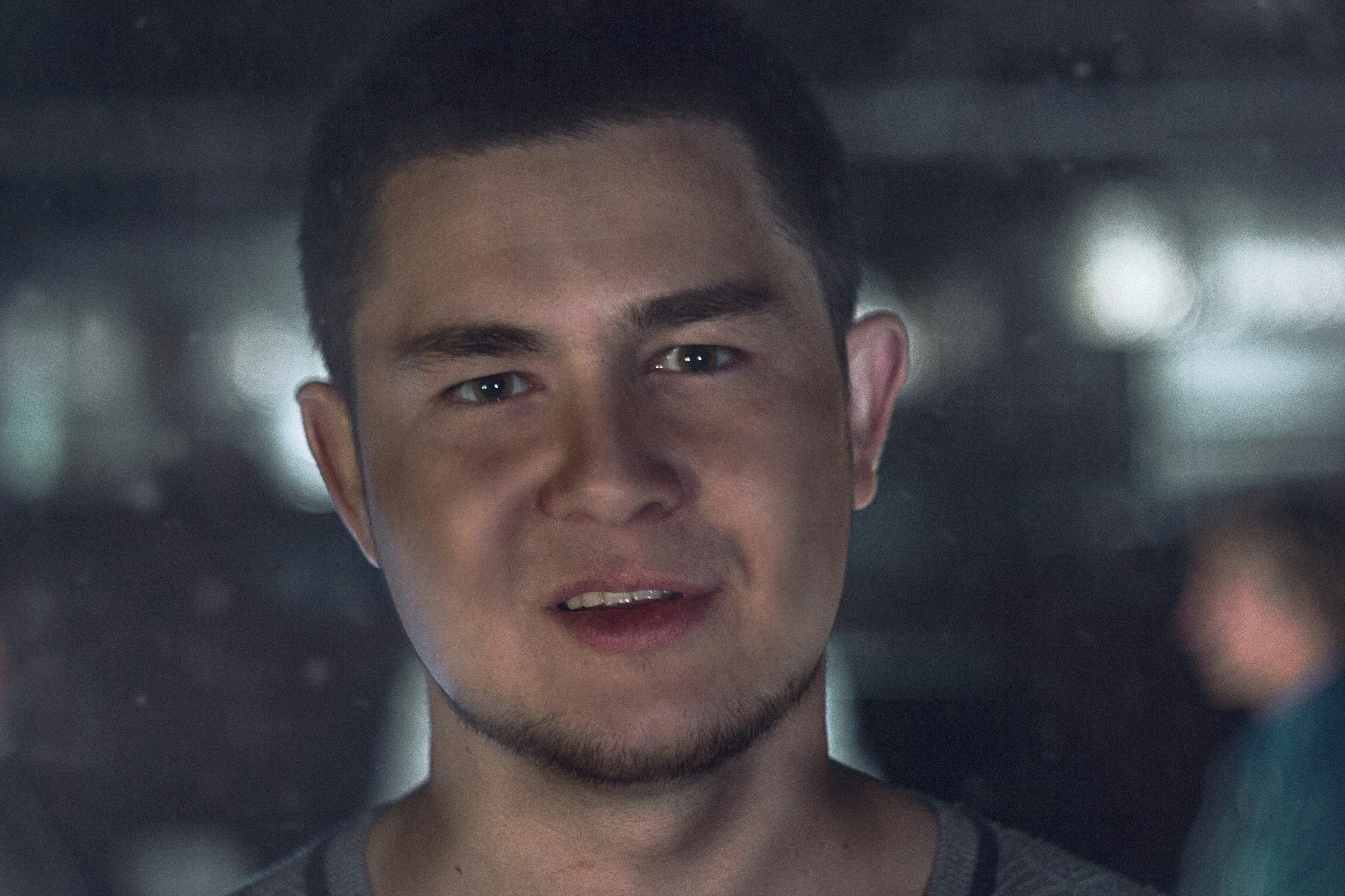 a close up of a person with a blurry background