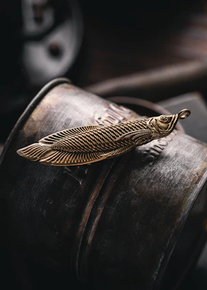 A finely detailed brass showpiece with intricate patterns catching warm light