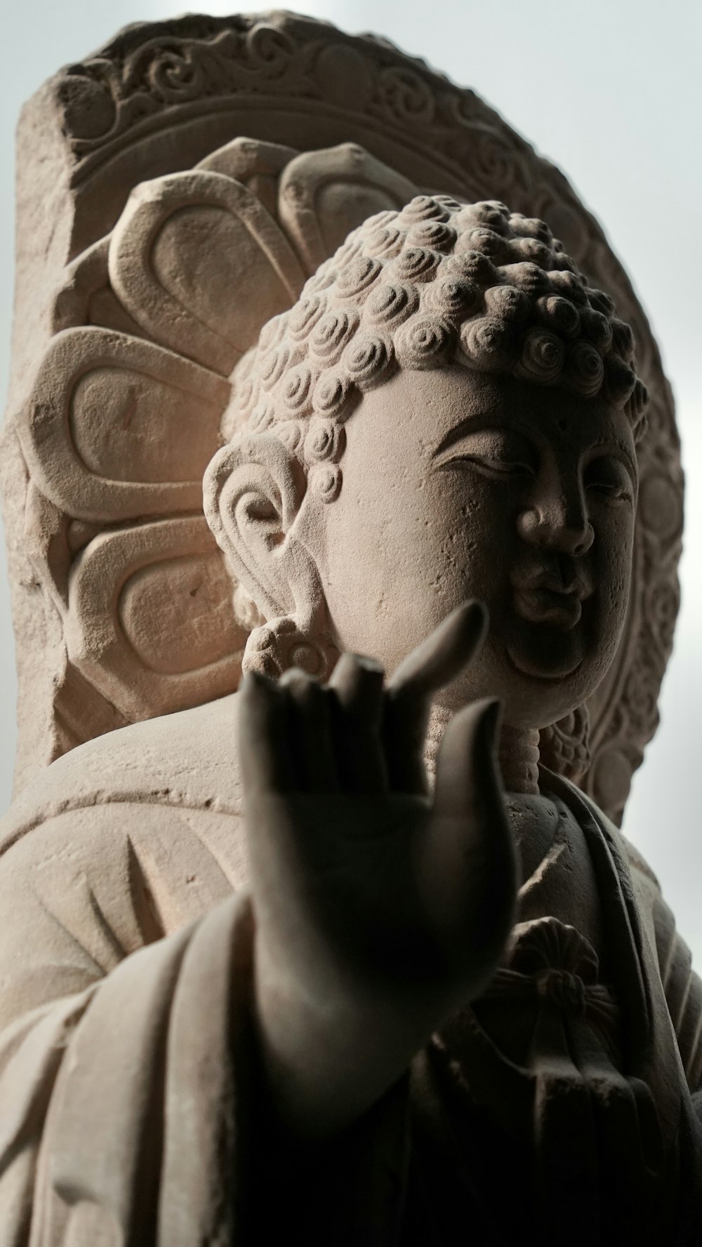 a close up of a statue of a buddha