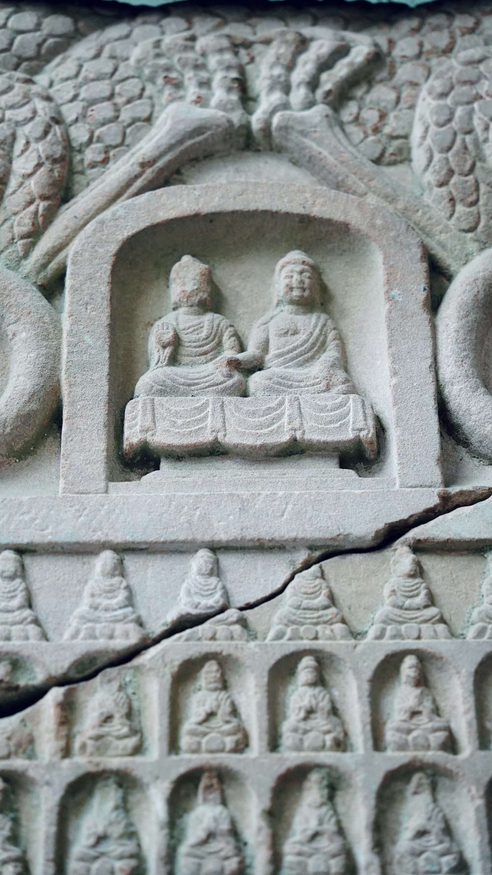 a close up of a carving on a wall