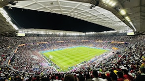 a large stadium filled with lots of people