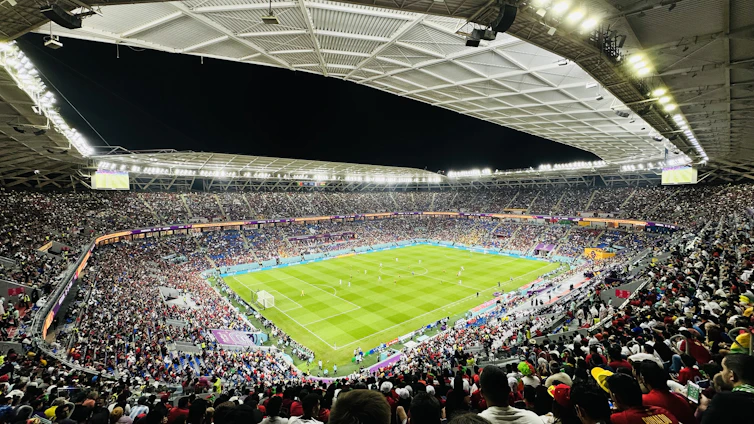 a large stadium filled with lots of people