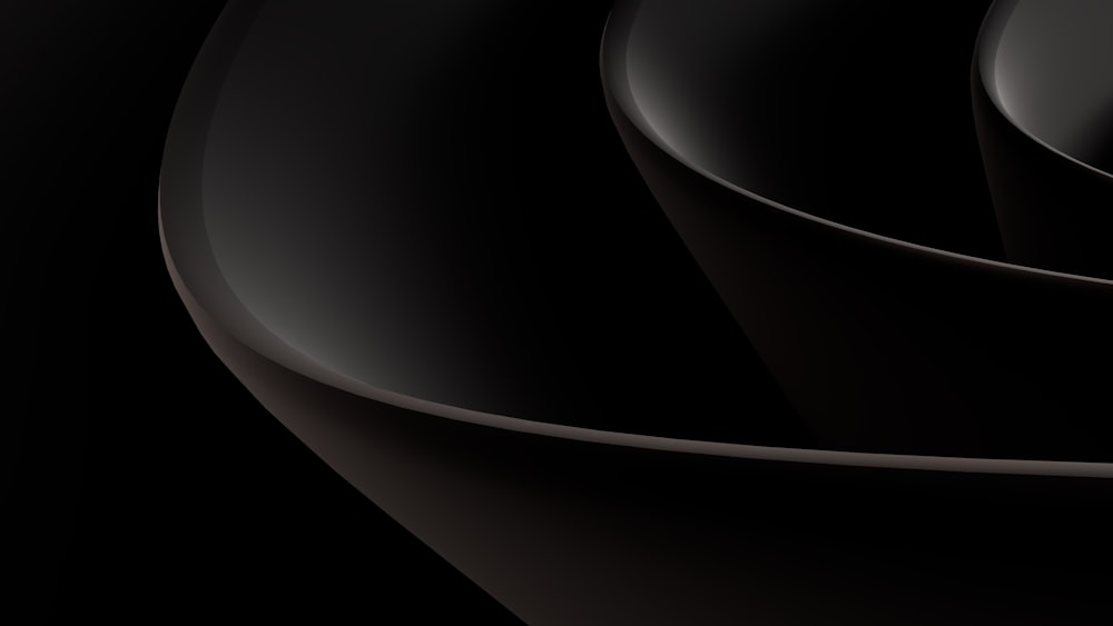 an abstract black background with curves and curves