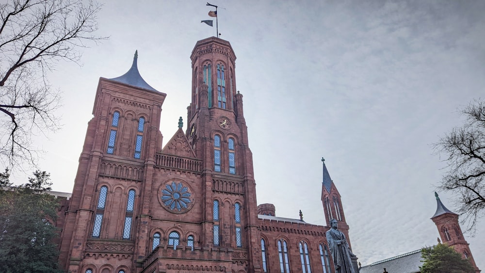 a large building with a clock on the front of it