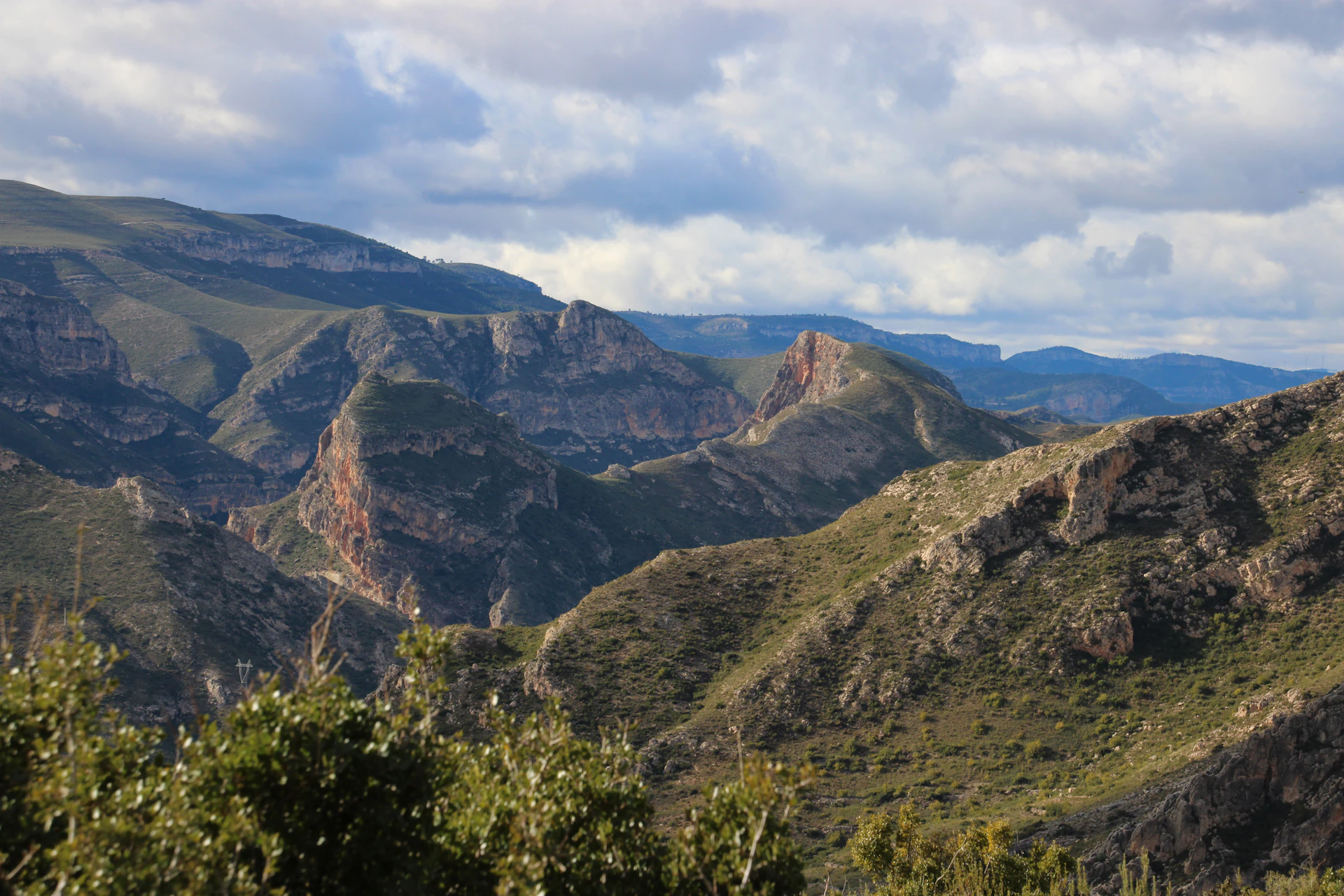 a view of a mountain range from a distance