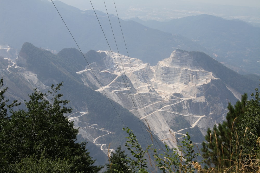 a view of a mountain with a road going through it