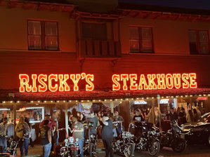 Road Eagles MC members gathered at Steve's Hangover Bar, sharing stories and laughter.