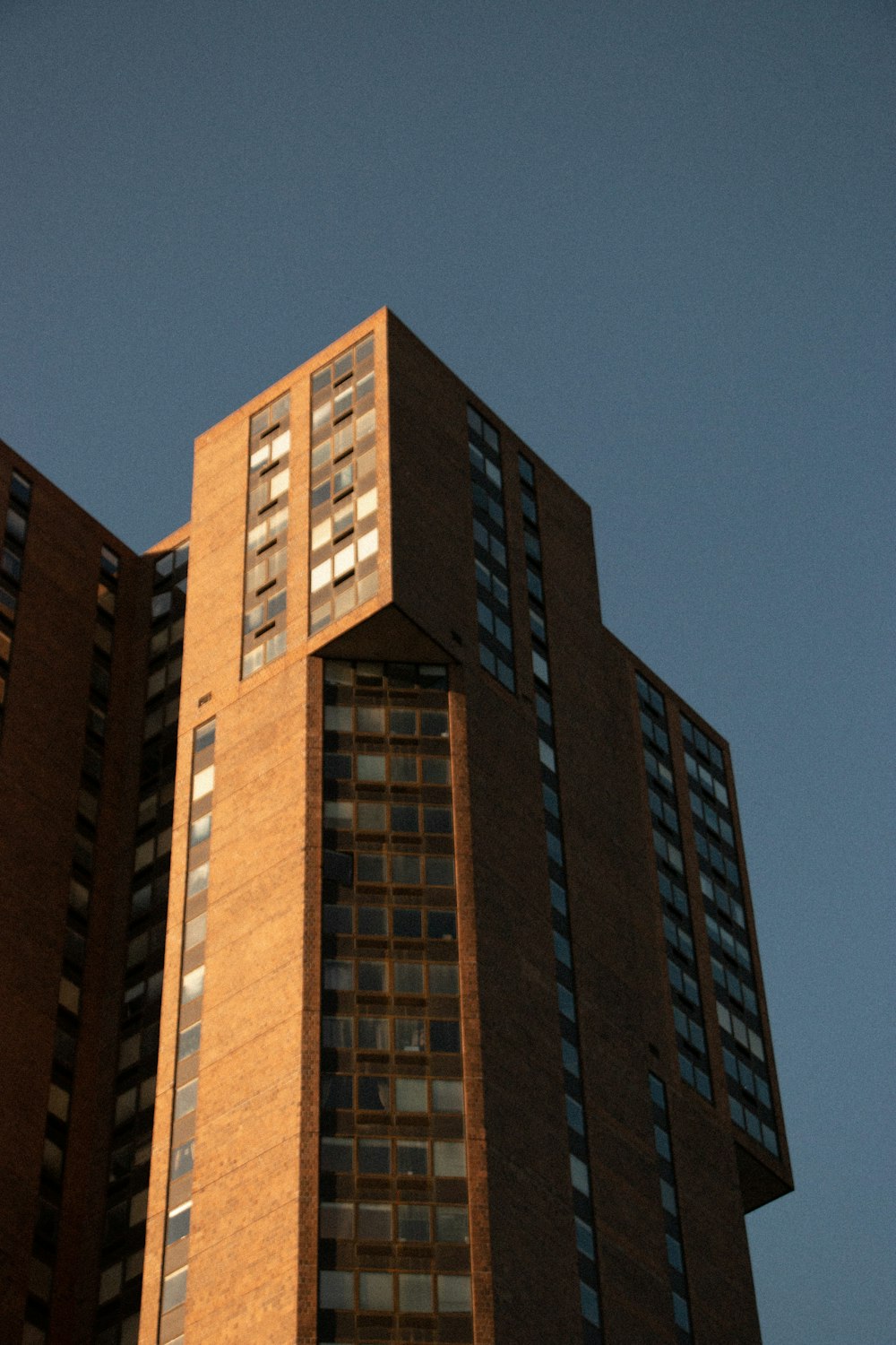 a tall building with a clock on the top of it