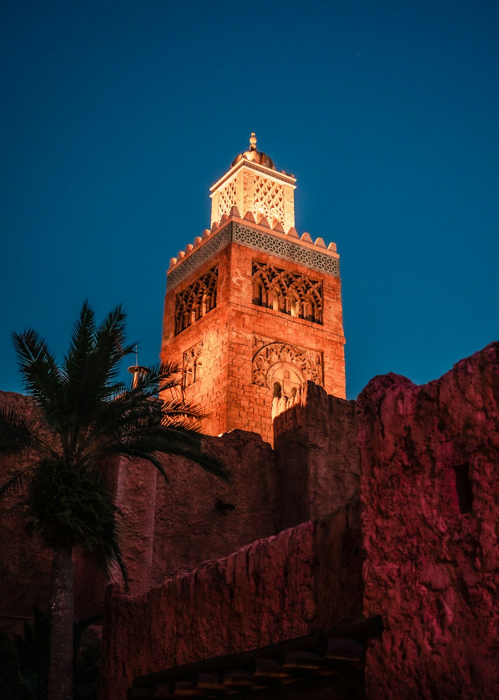 a tall tower with a clock on top of it