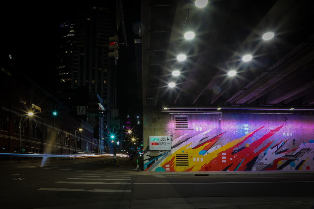 a city street at night with street lights