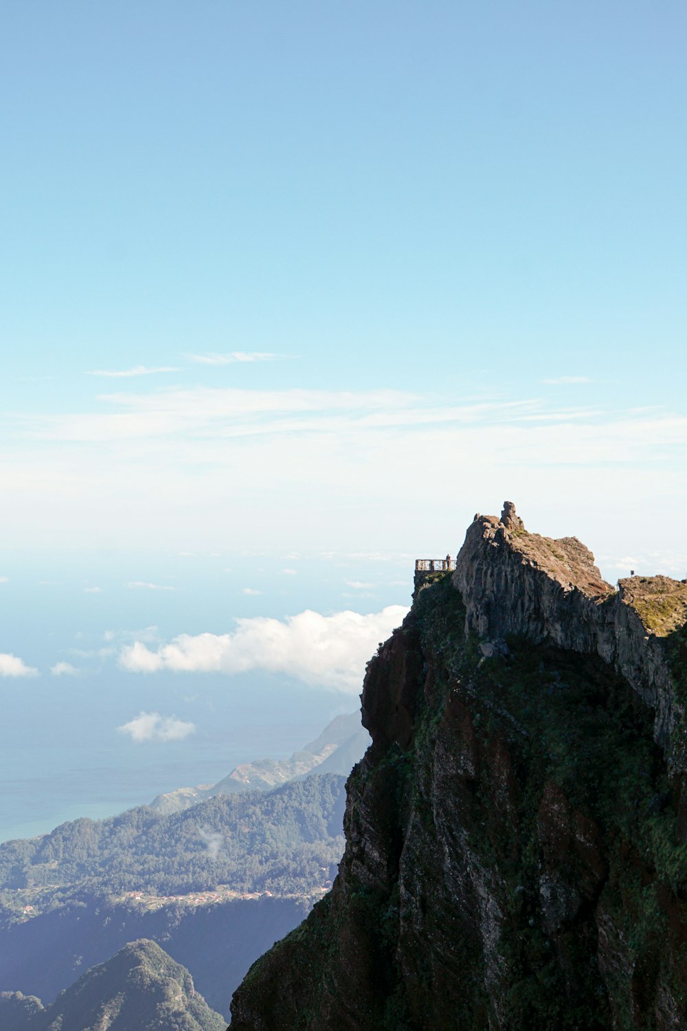 a person standing on top of a mountain