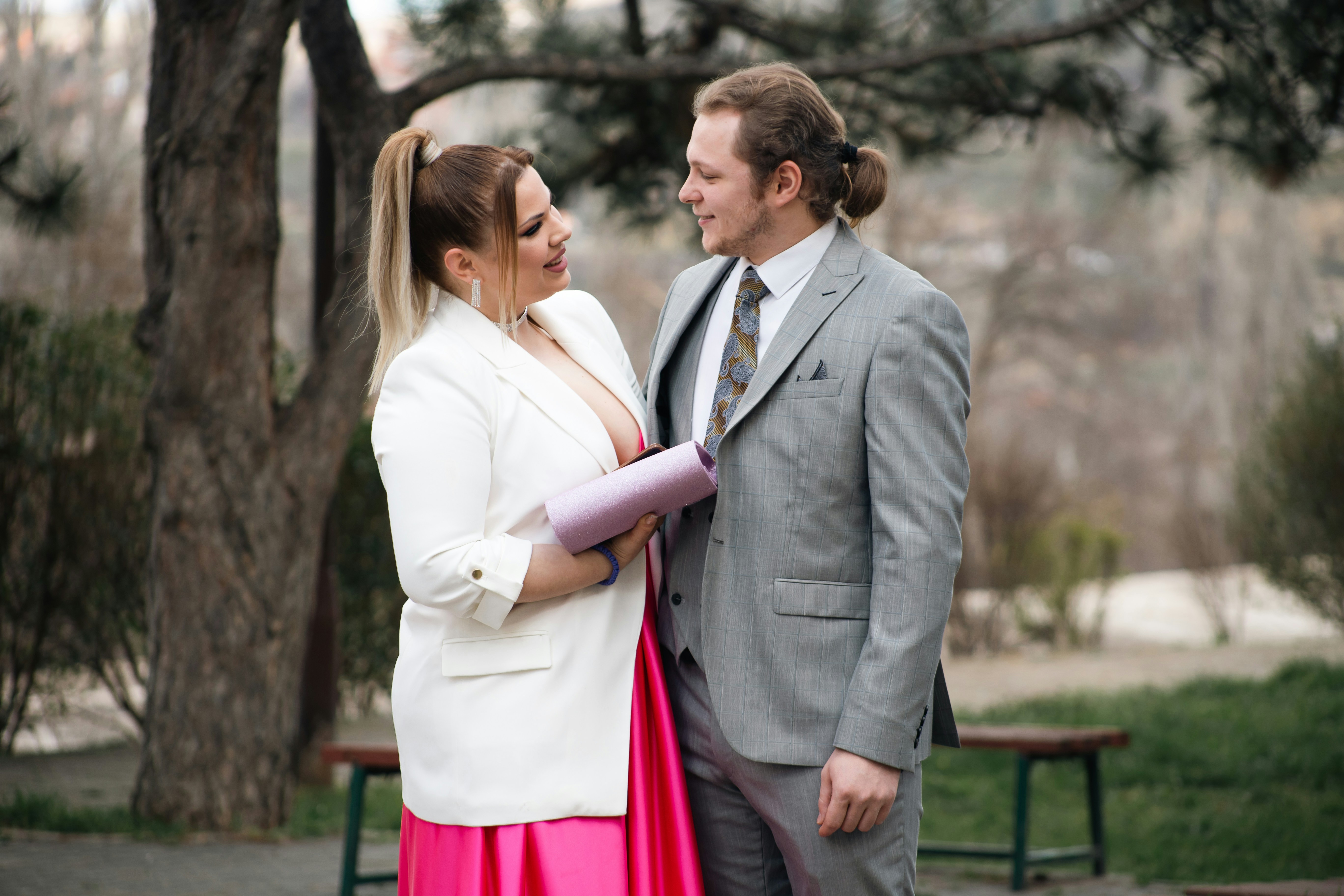 a man and a woman standing next to each other