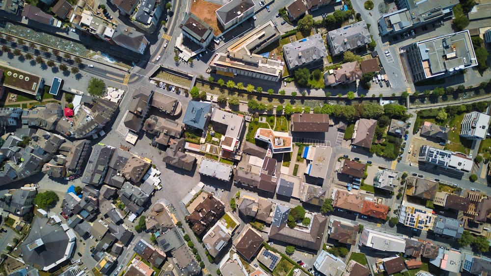 an aerial view of a city with lots of houses