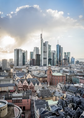 a view of frankfurt skyline with tall buildings