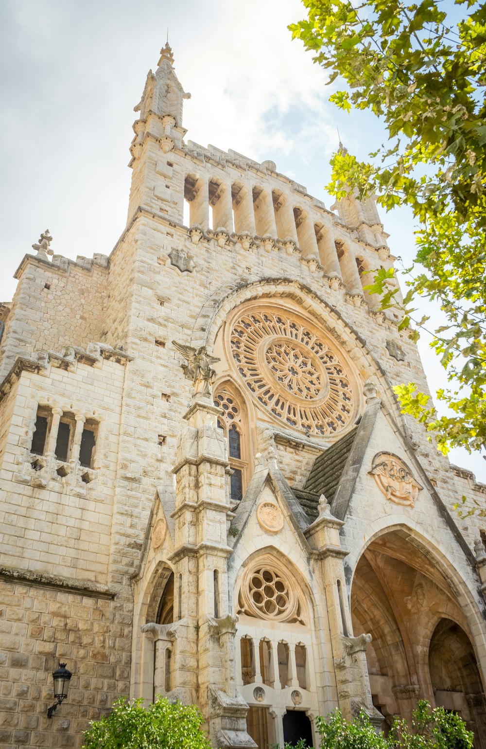 a large cathedral with a clock on the front of it