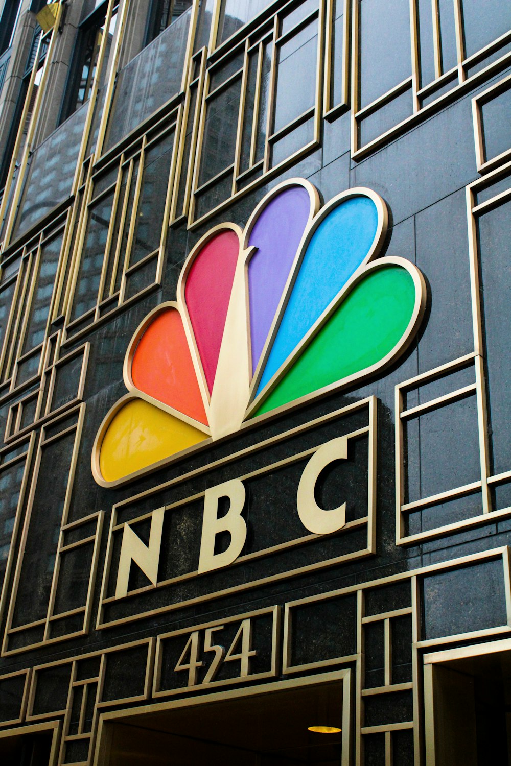 a building with a colorful nbc logo on it