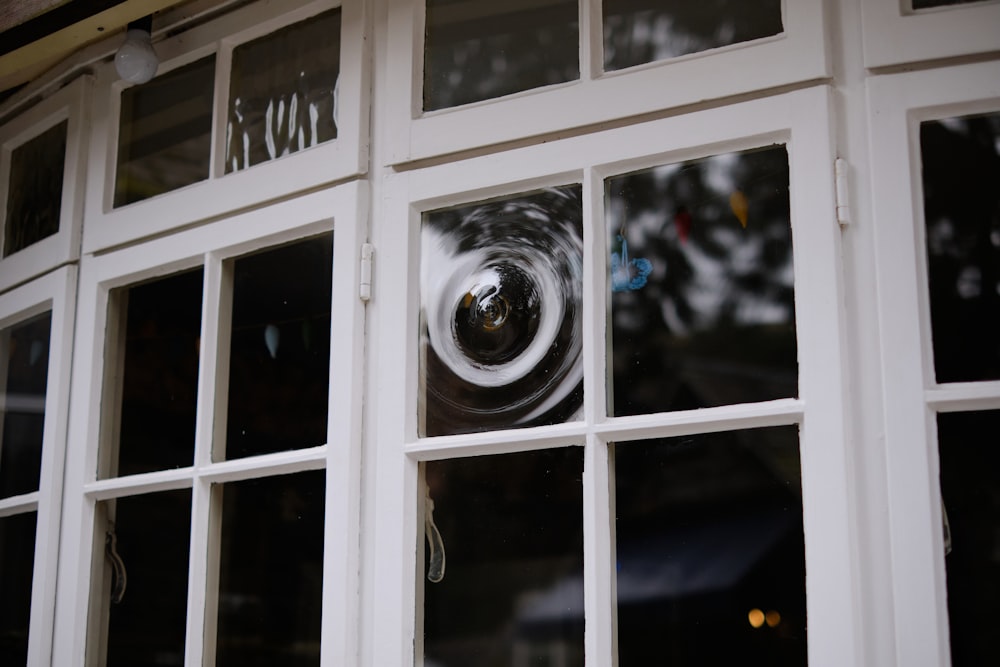 a close up of a window with a camera in it