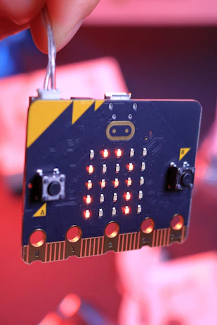 Array of colorful LED indicators lighting up on a šviesulė device during testing.