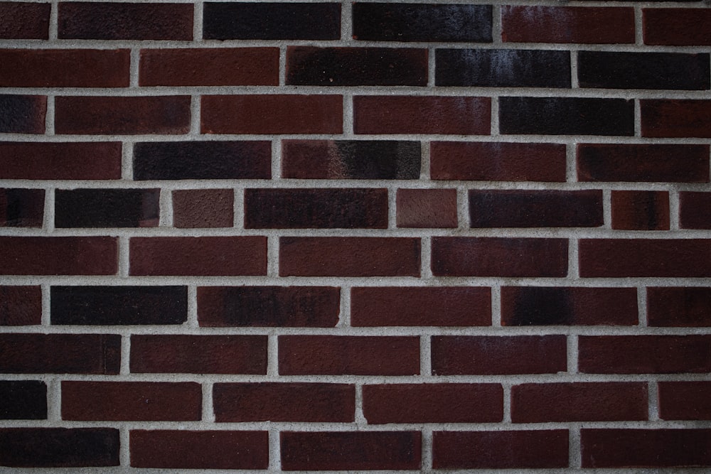 a close up of a red brick wall