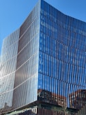 Modern office building exterior with clean lines and glass windows.