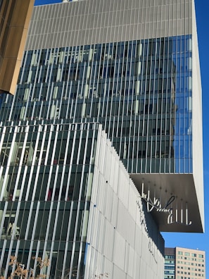 Completed commercial building with glass facade.