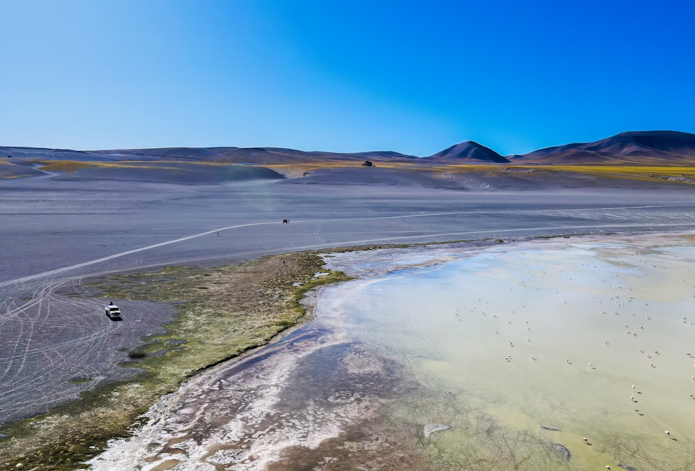 a large body of water surrounded by mountains