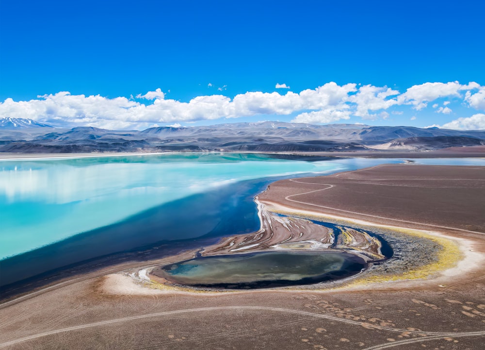 a large body of water surrounded by mountains