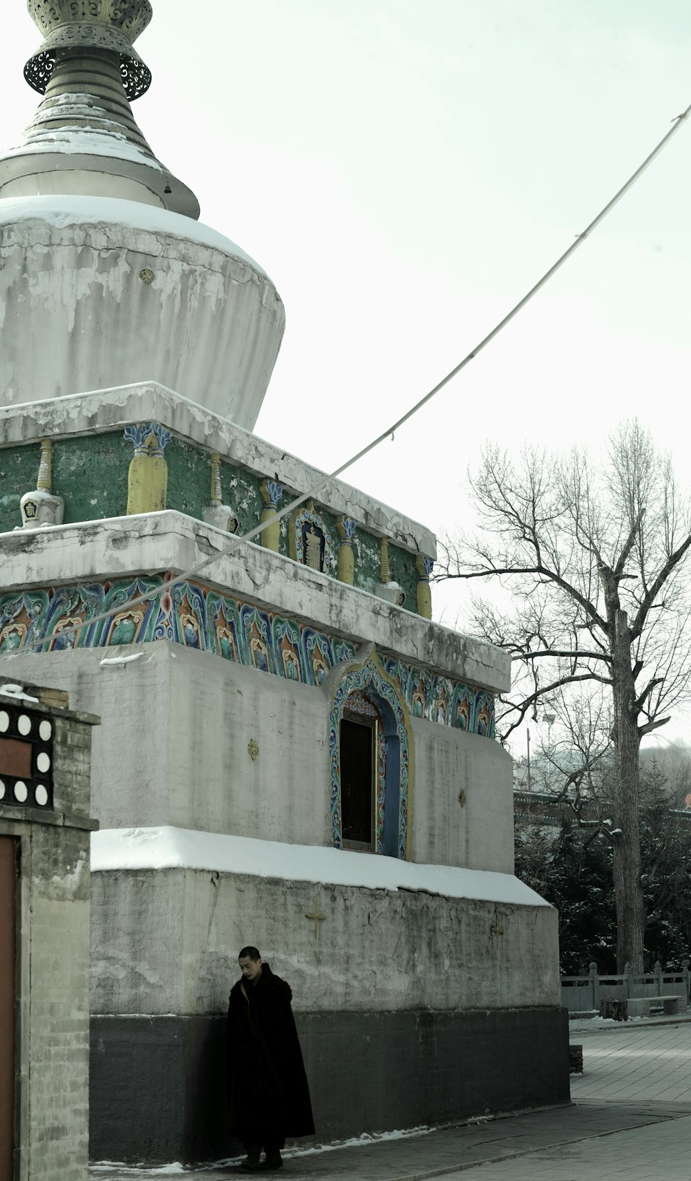 a person standing in front of a building