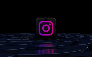 a purple instagram logo on a black background