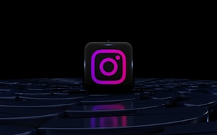 a purple instagram logo on a black background