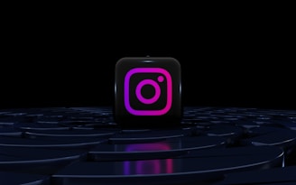 a purple instagram logo on a black background