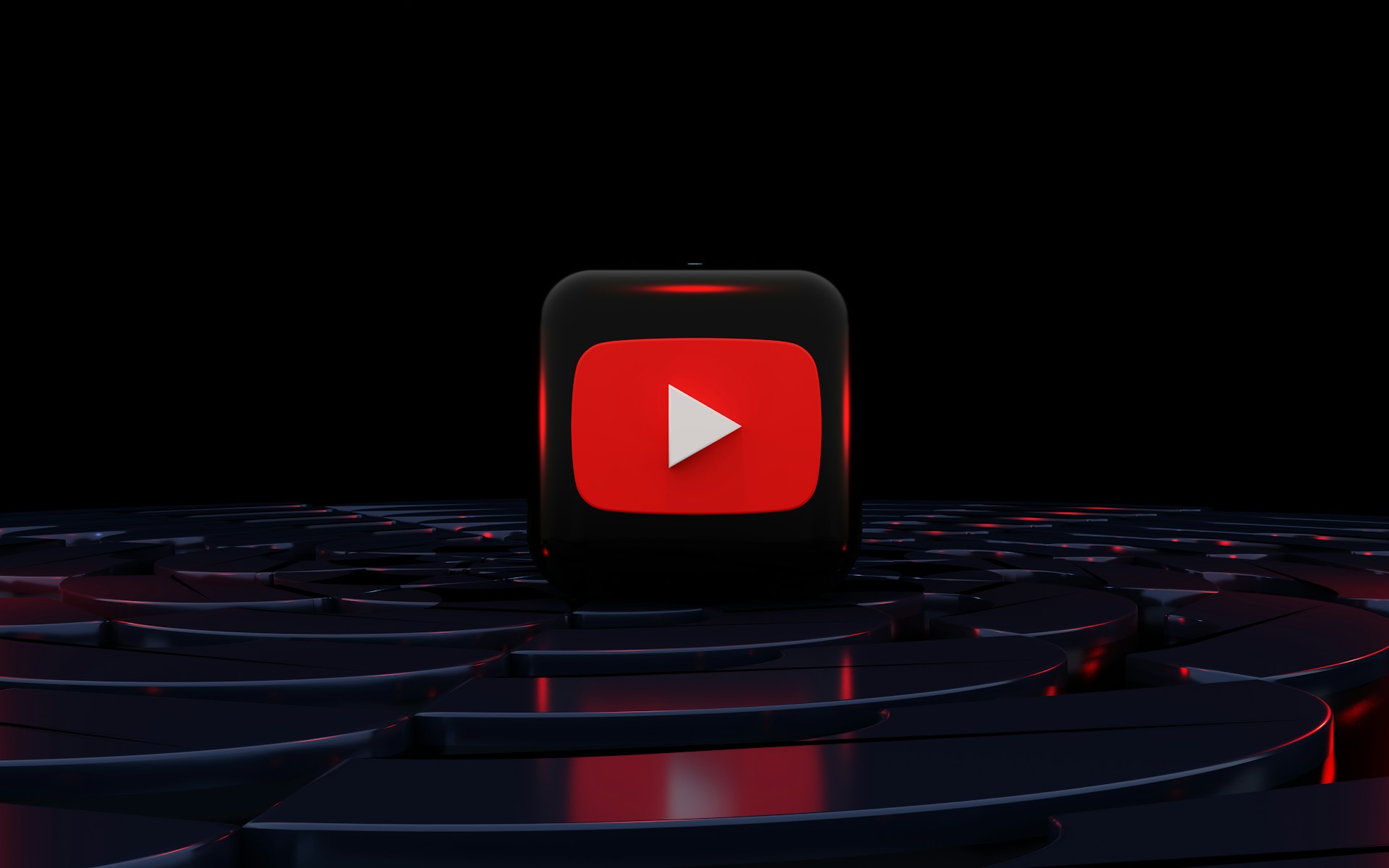 a red play button on a black background