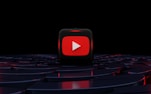 a red play YouTube button on a black background