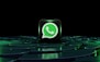 a green whatsapp icon sitting on top of a maze