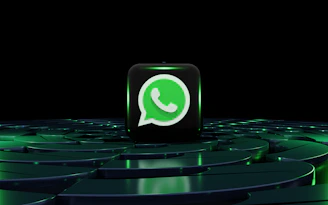 a green whatsapp icon sitting on top of a maze
