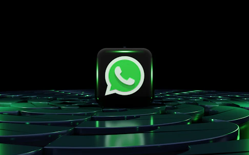a green whatsapp icon sitting on top of a maze