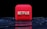 A red, cube-shaped icon with the word 'NETFLIX' prominently displayed in white, bold letters. The cube is set against a dark, glossy, circular patterned background, reflecting a sleek, futuristic design.