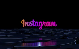 the word instagramn is lit up in the dark