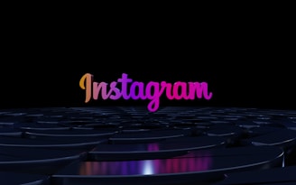 the word instagramn is lit up in the dark