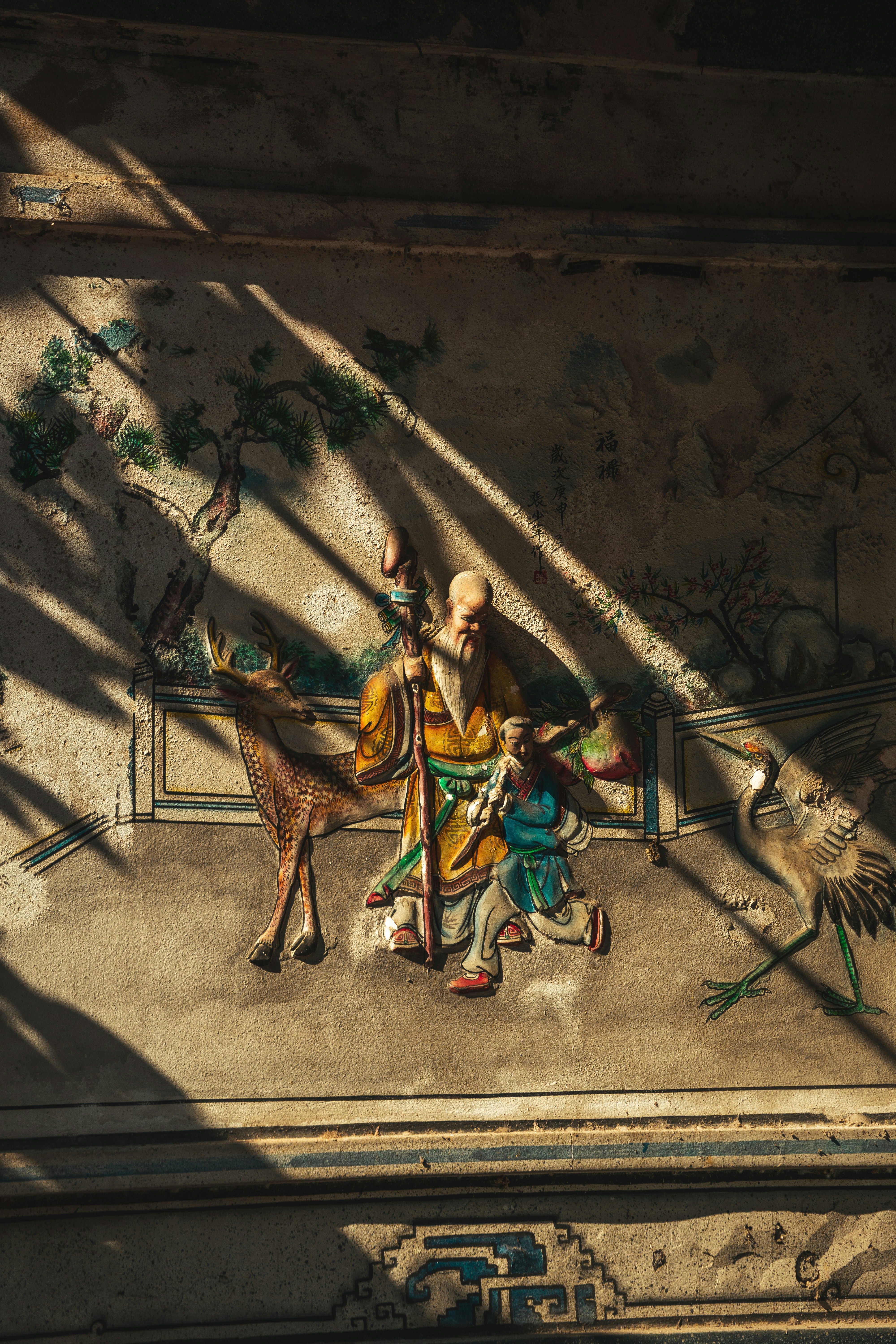 a painting of a man sitting on a bench next to a child