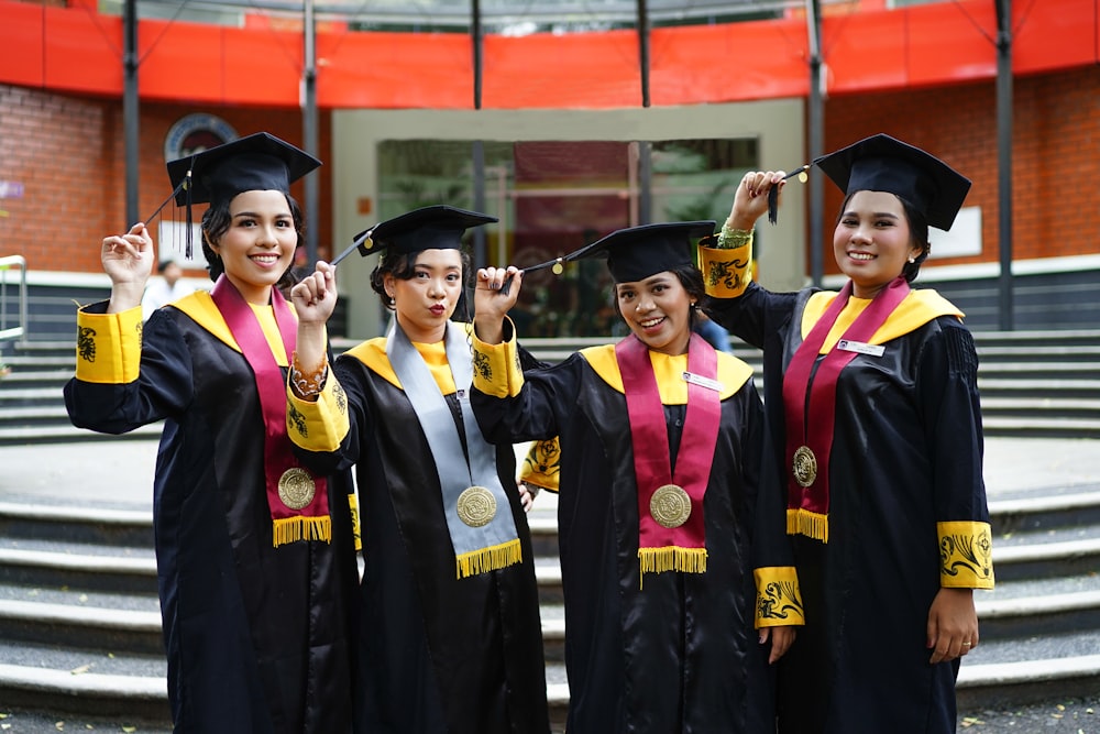 a group of young women standing next to each other