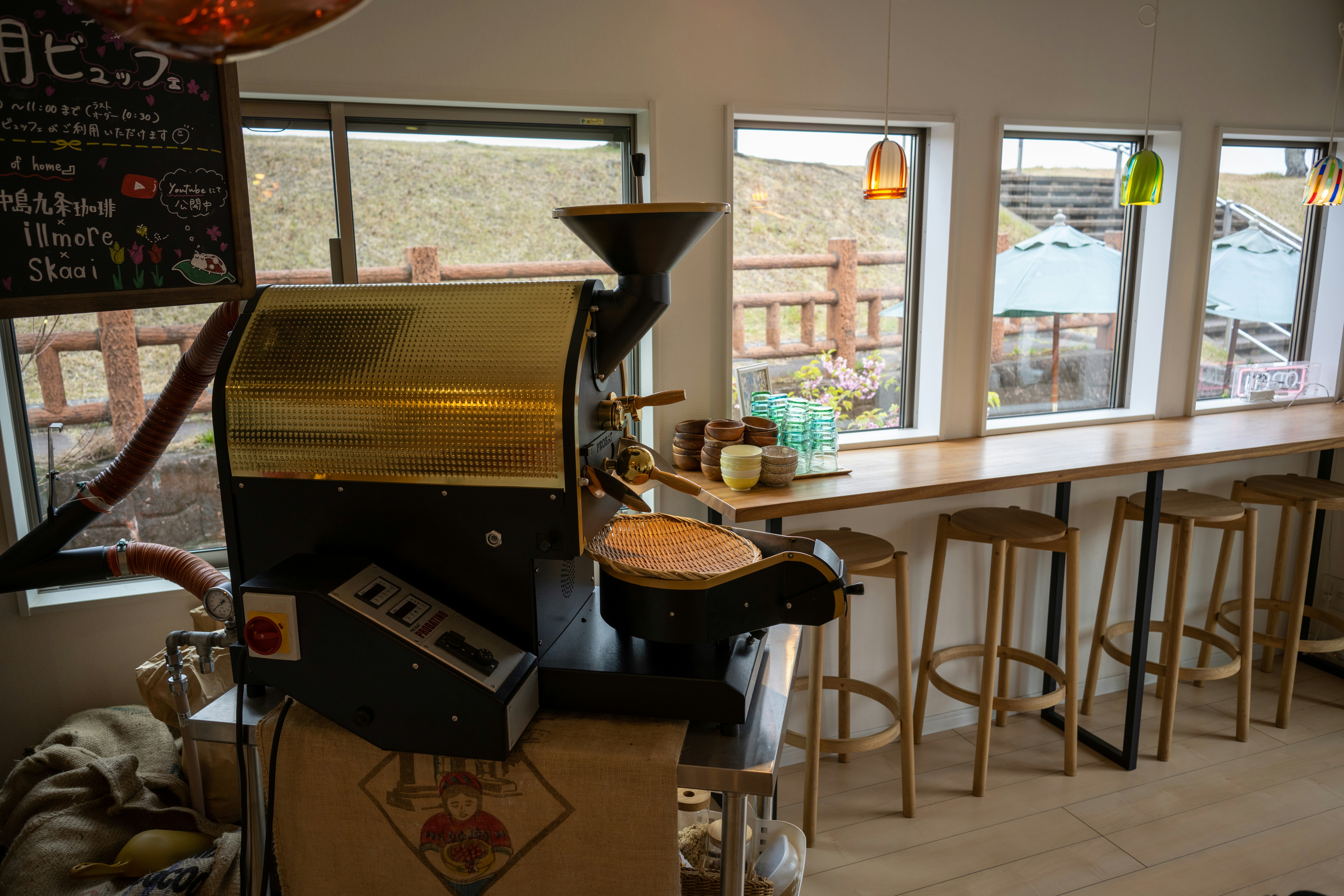 a coffee machine sitting in front of a window