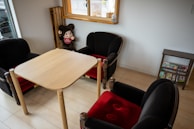 A cozy waiting area with children's toys and magazines.