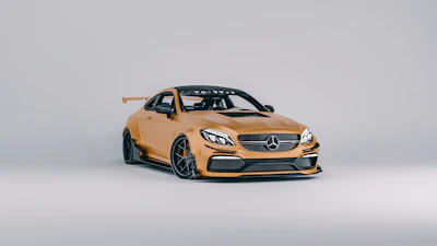 Custom bodywork details on a luxury coupe, highlighting sharp lines and metallic gold accents.