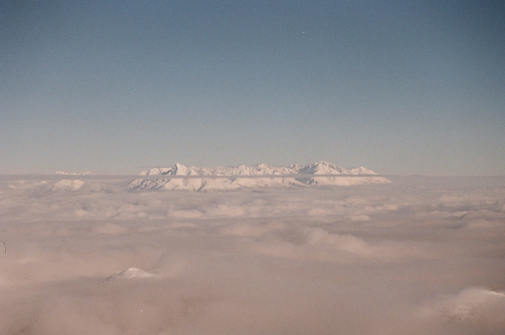 a view of a mountain range from an airplane