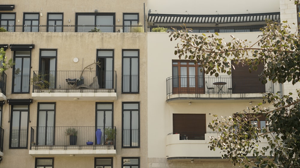 an apartment building with balconies and balconies on the balconies